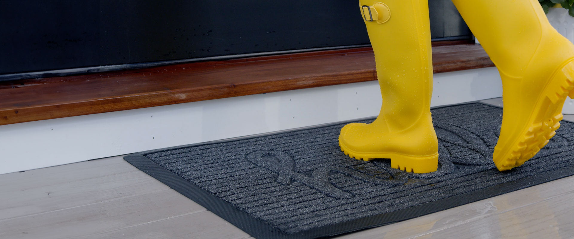 Yellow boots on a Gorilla Grip doormat ensure no tracked-in mud